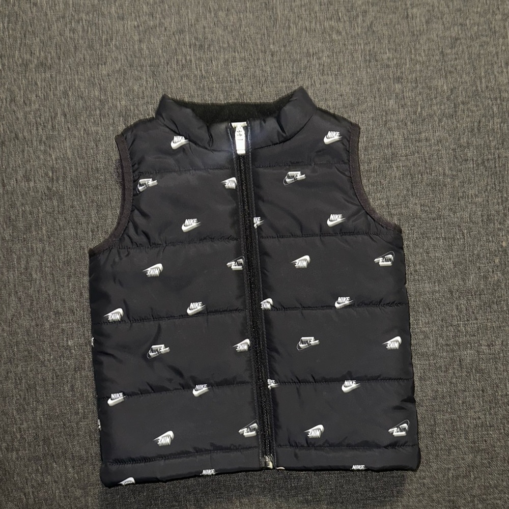 Black Nike Puffer Vest with Logo Pattern